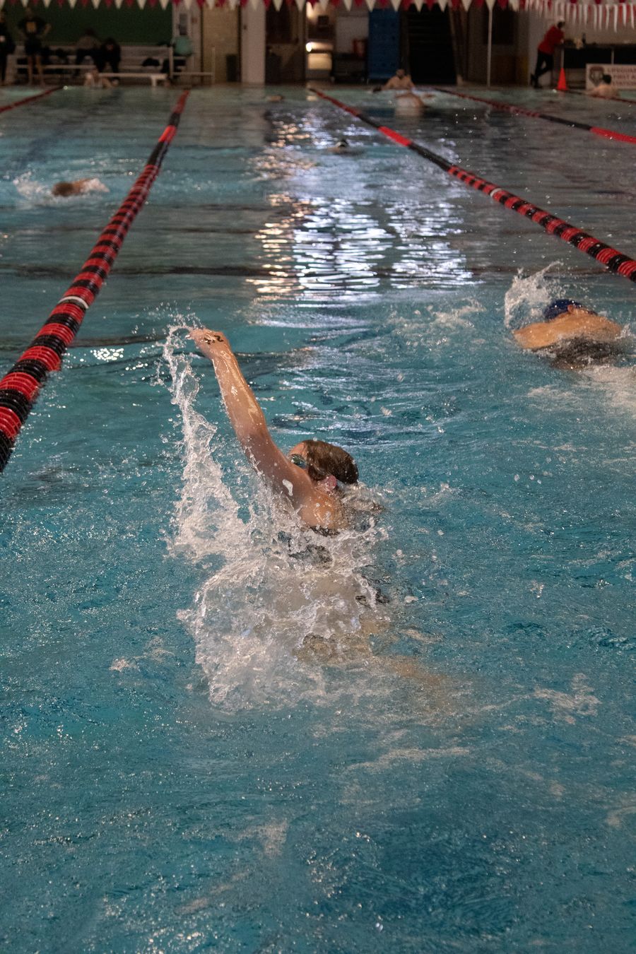 Chloe swimming at the lobo triathlon